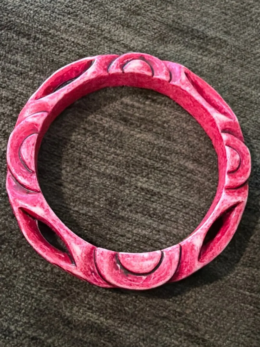 Vibrant pink carved resin bangle Art Deco-style design